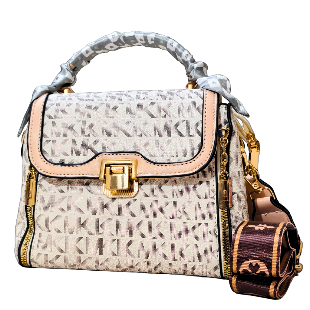 Designer handbag with monogram pattern on a white background