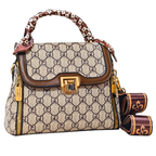 Designer handbag with matching pouch on a white background