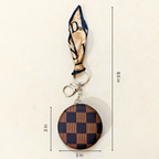 Round Brown Check Pocket Mirror  With Measurements On  Beige Background.