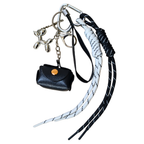 Black leather charm with white and black braided cord on a white background