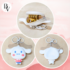 Keychain with cartoon character design on a pink background