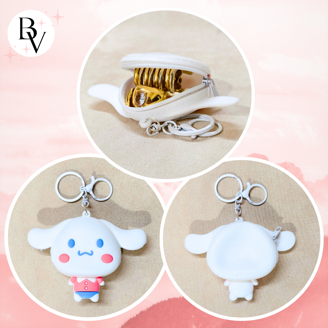 Keychain with cartoon character design on a pink background