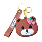 Brown bear-shaped keychain with a strawberry on a white background
