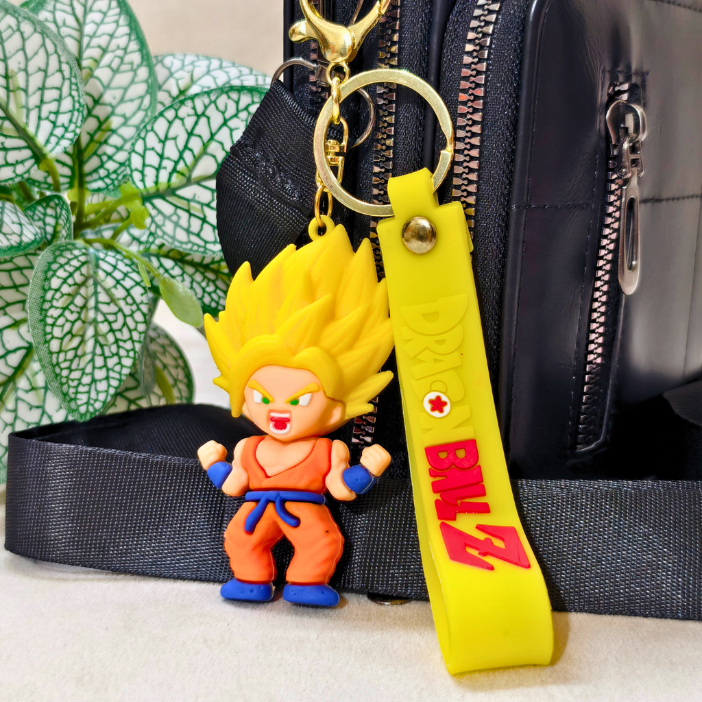 Super Saiyan Key Ring Attached With Purse On Beige Background.