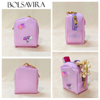 Collage of a pink backpack with decorative elements on a beige background, featuring the brand 'BOLSAVIRA'.