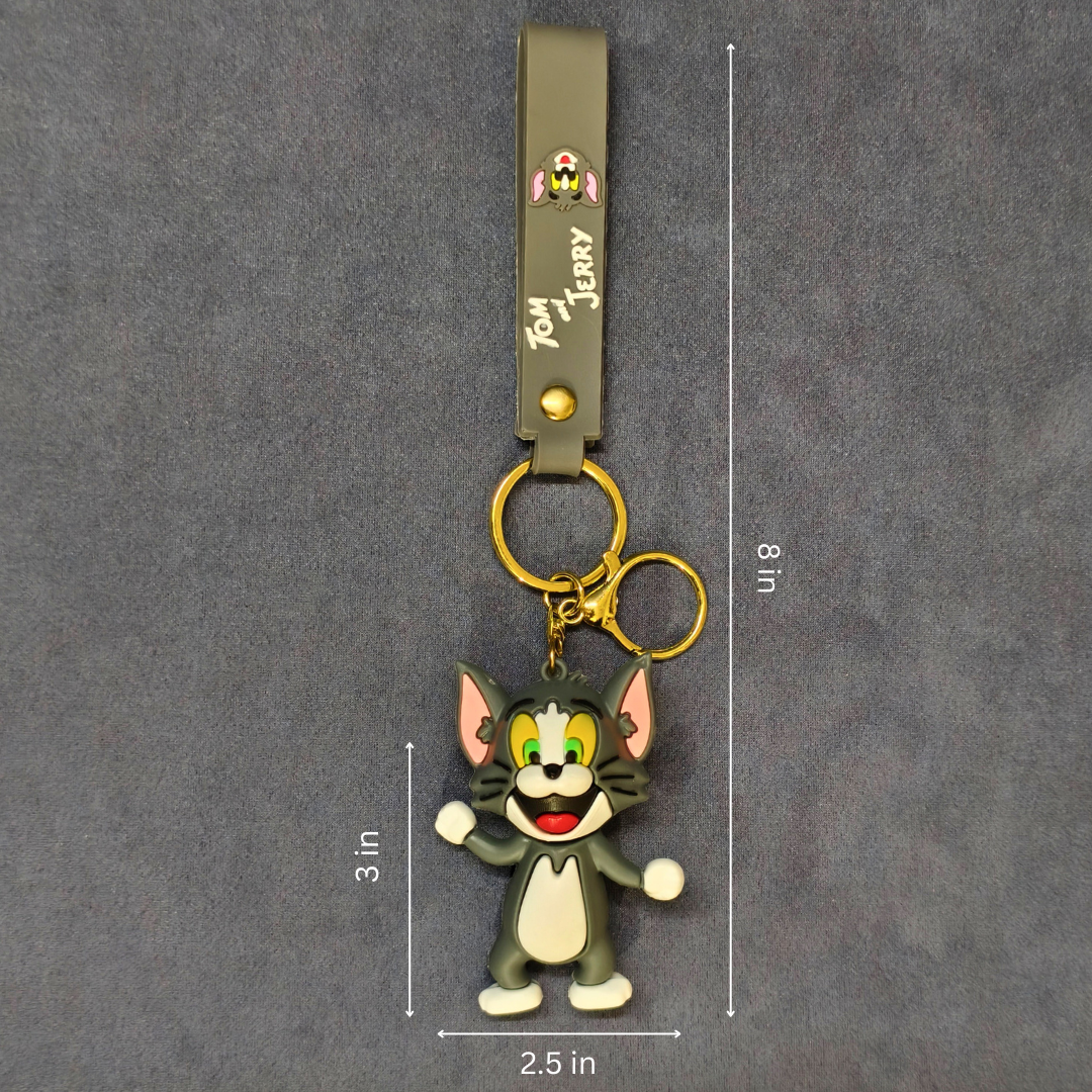 Tom and Jerry keychain with measurements on a gray background