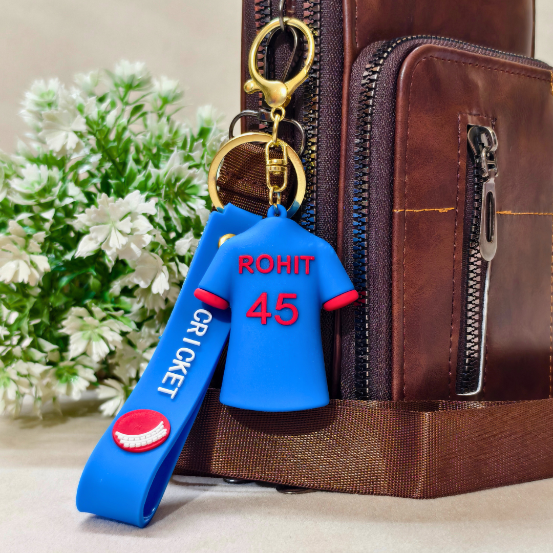 
Rohit Keyring Attached With Purse As  Bag Charm On  Beige Background.