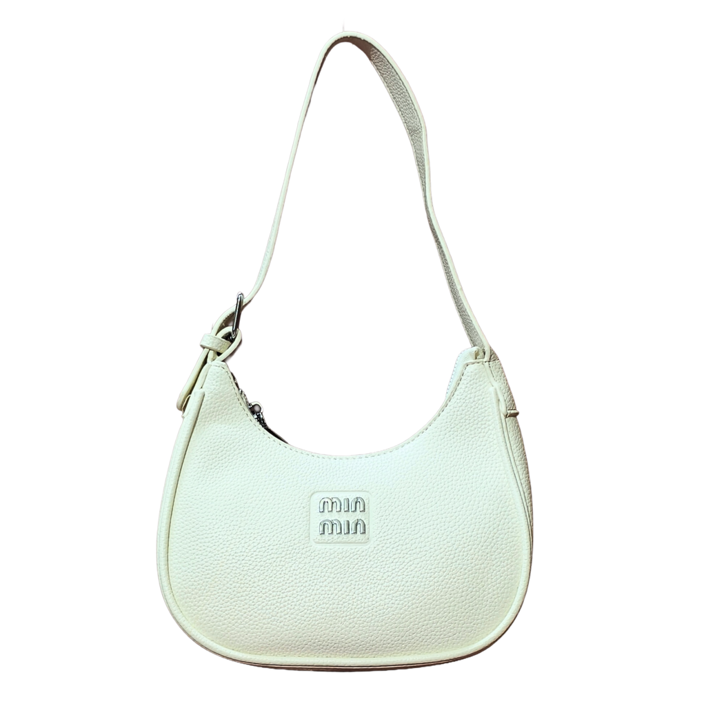 White handbag with 'min min' logo on a white background
