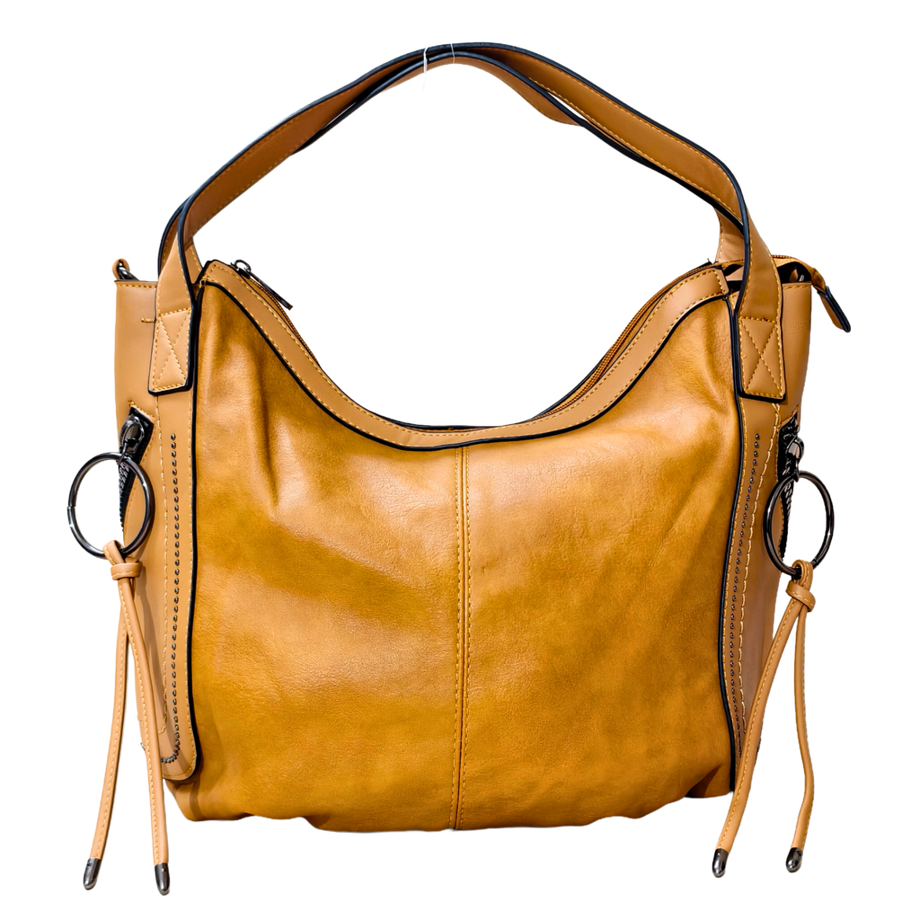 Brown leather handbag with black accents on a white background