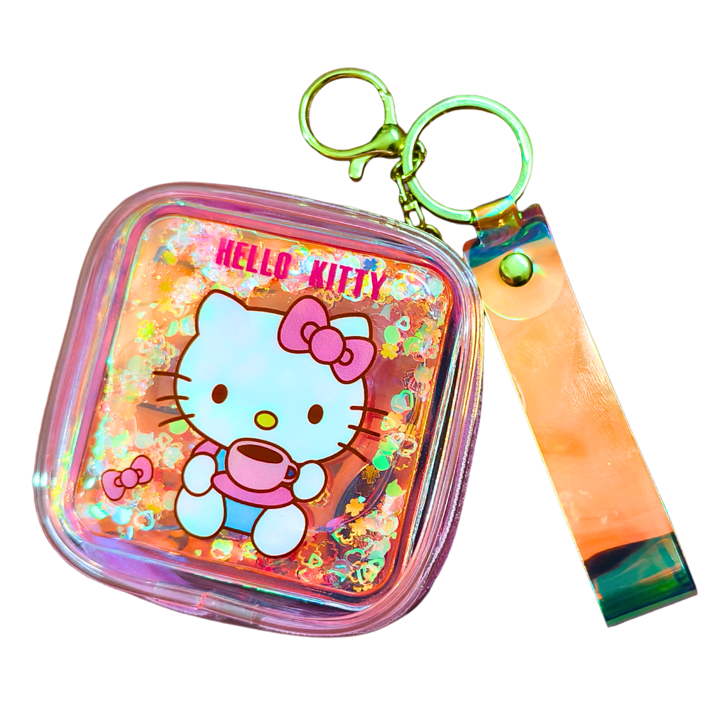 Hello Kitty case with keychain and nail file on a white background