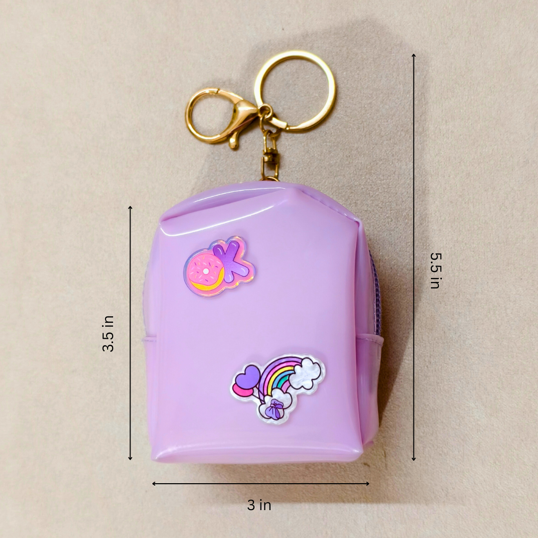 Purple keychain case with cartoon designs and measurements on a beige background