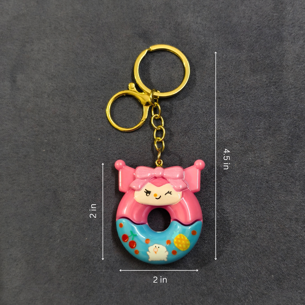 Keychain with cartoon character design on a dark gray background