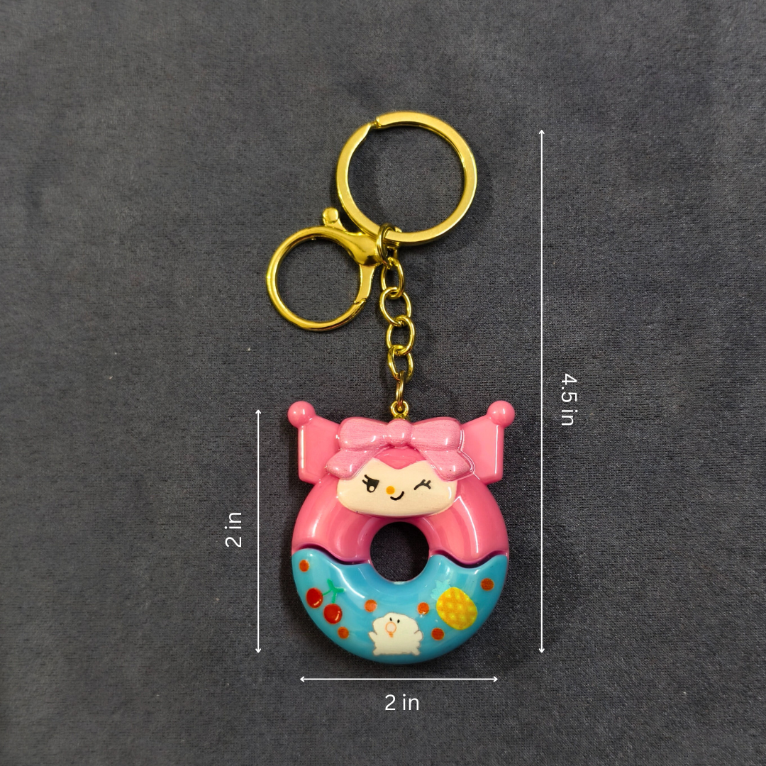 Keychain with cartoon character design on a dark gray background
