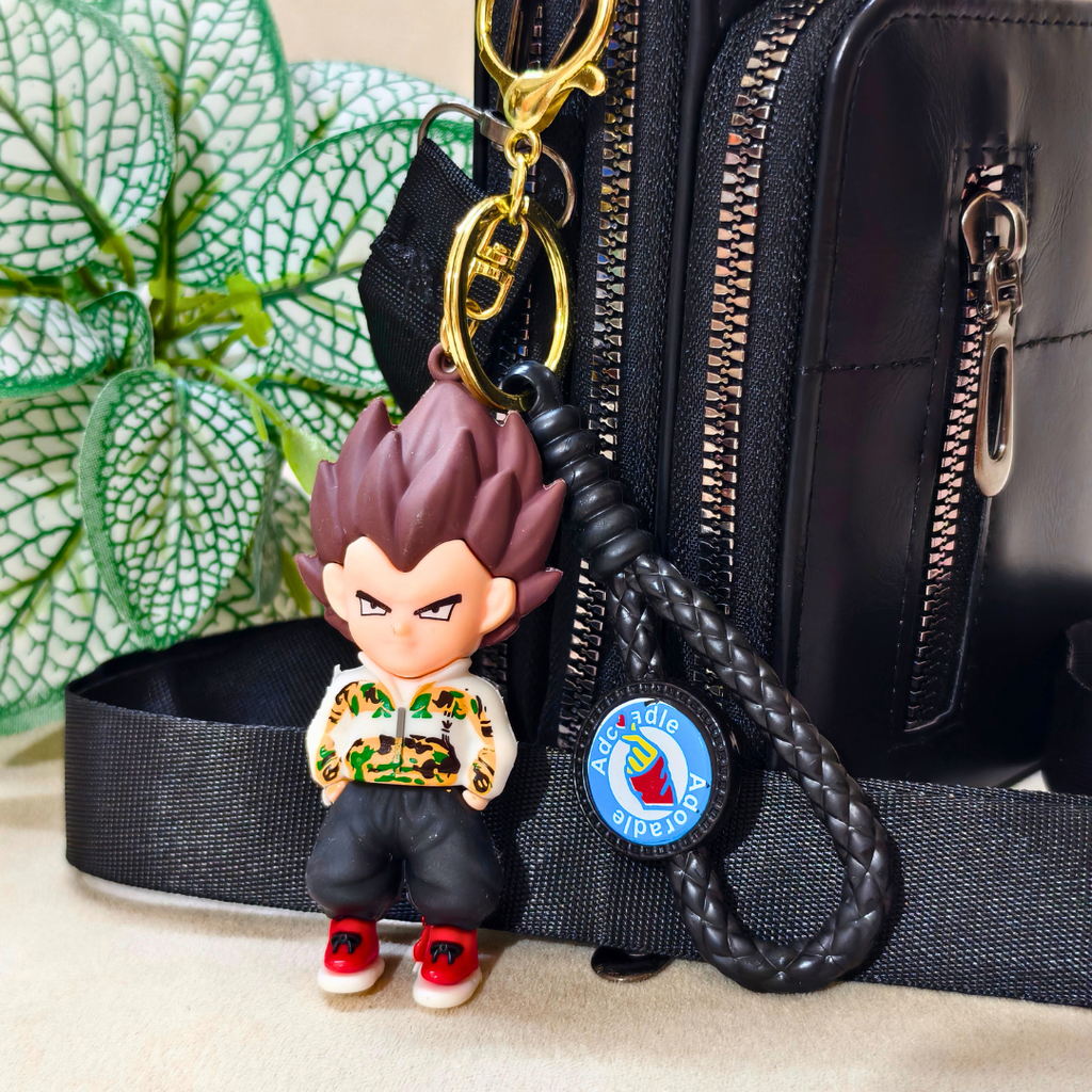 Vegeta Casual Keyring  Attached On Purse As Bag Charm On Beige Background.