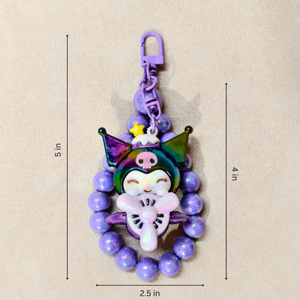 Colorful keychain with measurements on a beige background