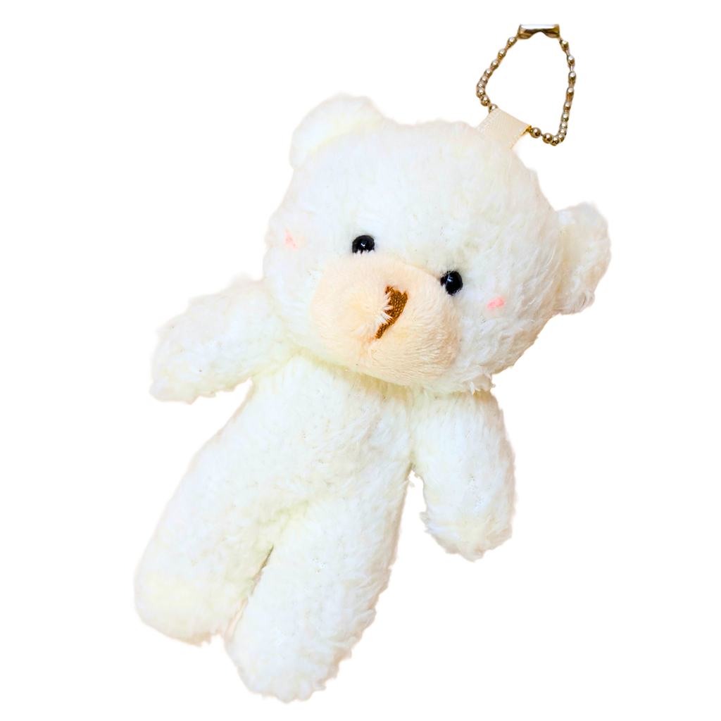 White teddy bear keychain on a white background