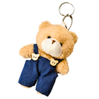 Teddy bear keychain with blue overalls on a white background