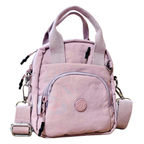 Pink backpack with multiple compartments and a visible brand logo on a white background