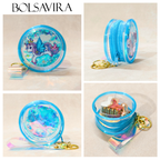 Collage of a blue yoyo with unicorn design and keychain, branded 'BOLSAVIRA'.