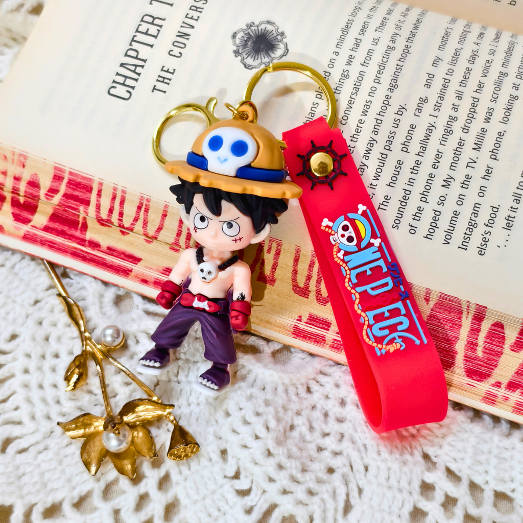 Buff Luffy Keyring  With Props On Crochet Background.