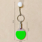 Sporty Table tennis Keyring Attached with silver chain and ring along with white ball showing with measurements on beige background.
