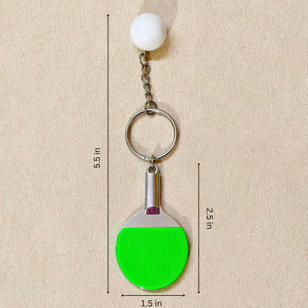 Sporty Table tennis Keyring Attached with silver chain and ring along with white ball showing with measurements on beige background.