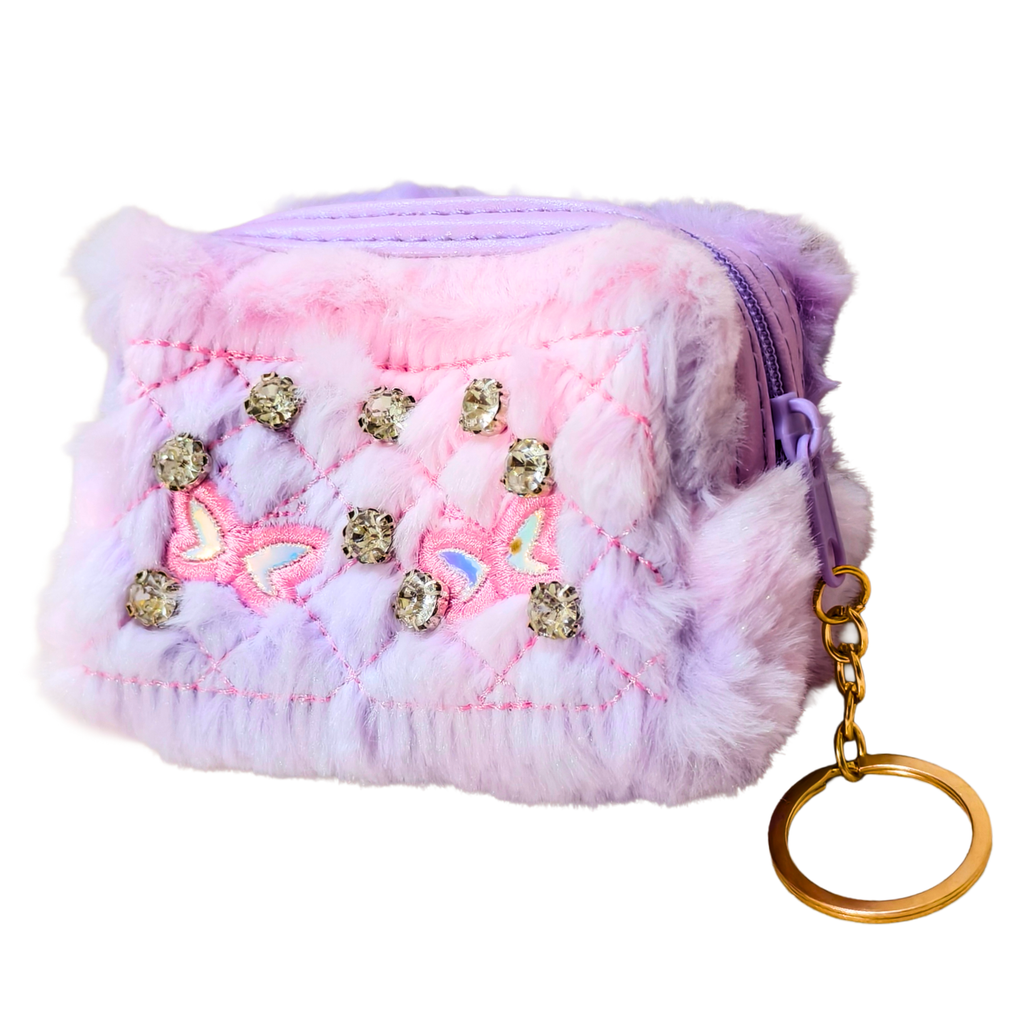 Pink and purple fluffy pouch with gold accents and a keychain on a white background
