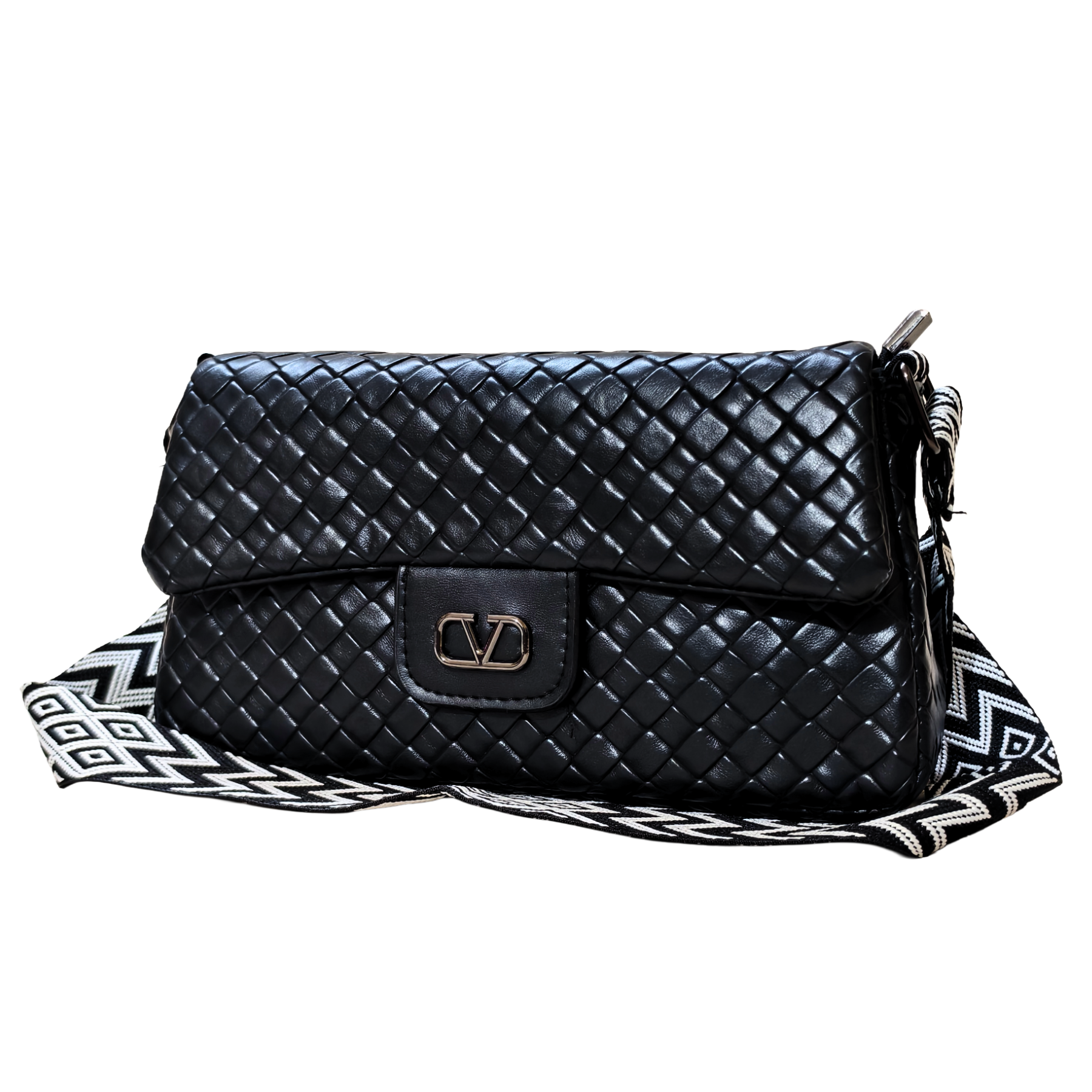 Black quilted handbag with a strap on a white background