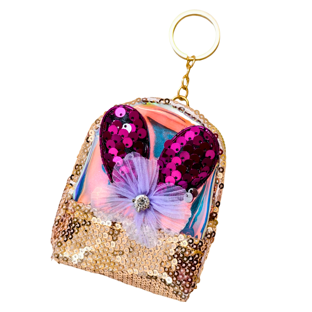 Keychain with sequins and butterfly design on a white background