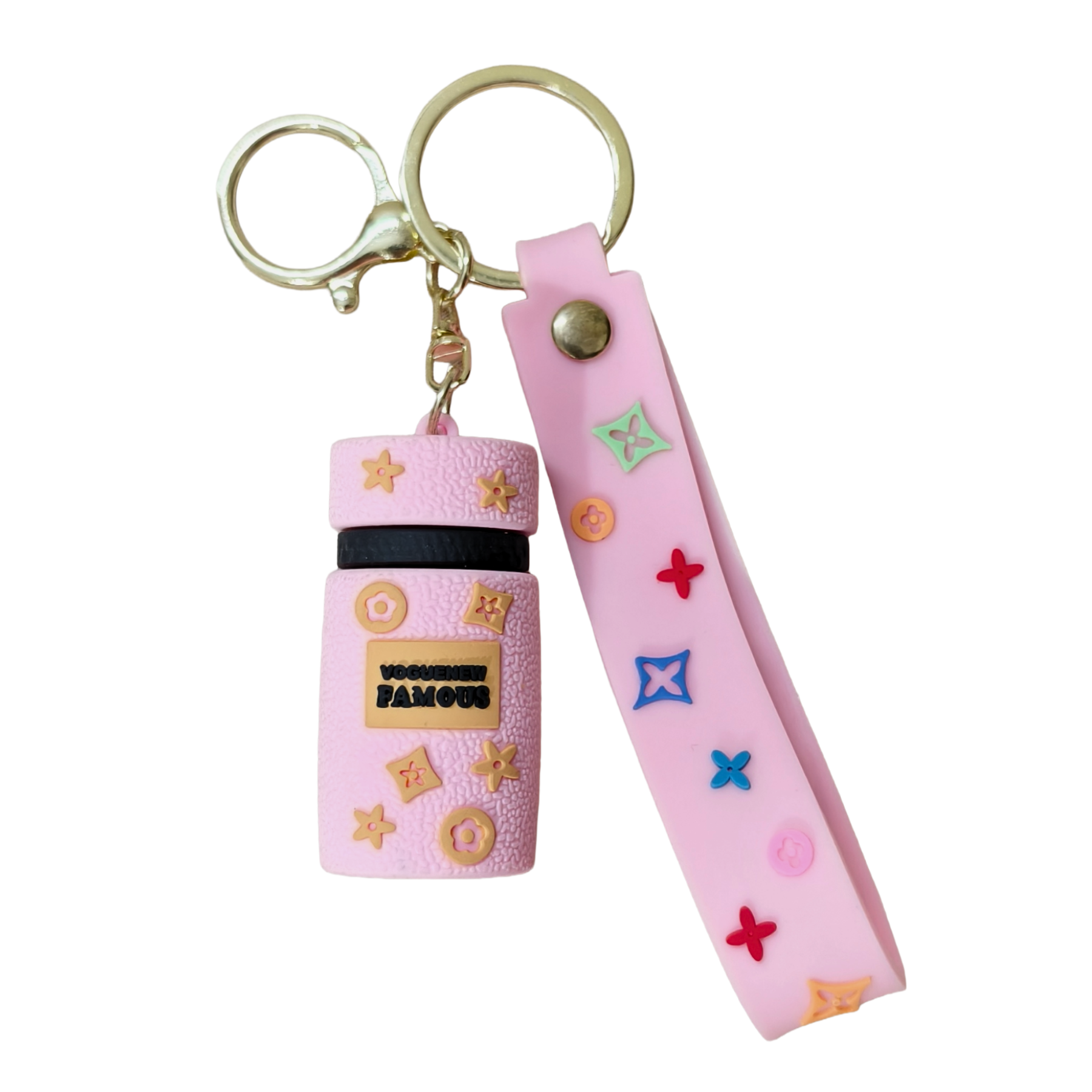 Pink keychain with decorative elements on a white background