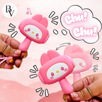 Two pink cartoon-style rattles held by hands with a pink background and 'Chu! Chu!' text.