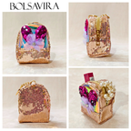 Collage of a decorative pouch with sequins and embellishments, featuring the brand 'BOLSAVIRA'.