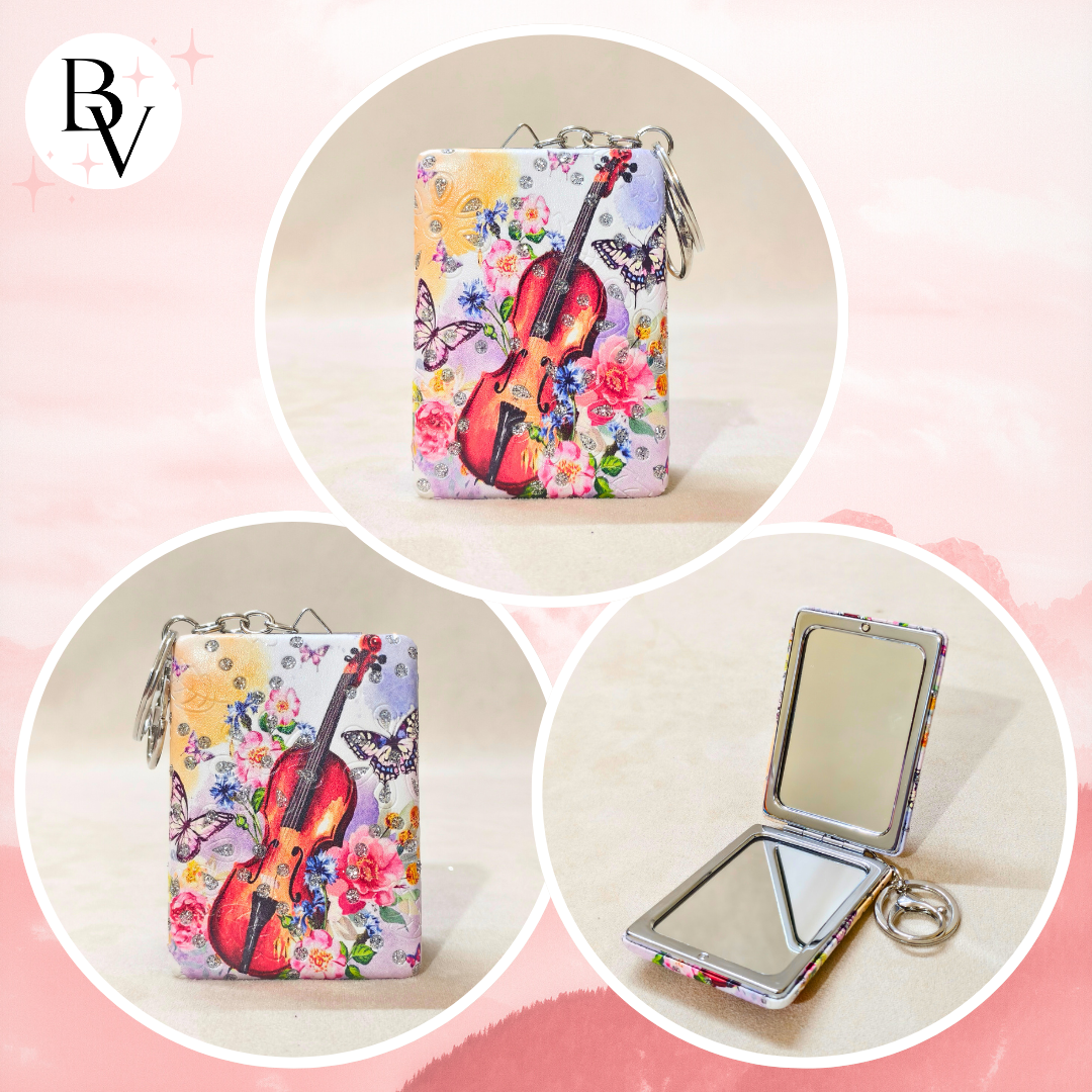Colorful case with a cello design and mirror on a pink background
