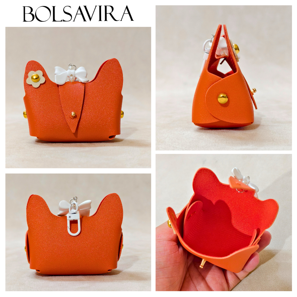 Collage of an orange cat-shaped pouch with floral details, displayed from multiple angles.