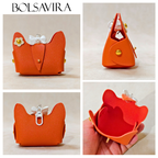 Collage of an orange cat-shaped pouch with floral details, displayed from multiple angles.