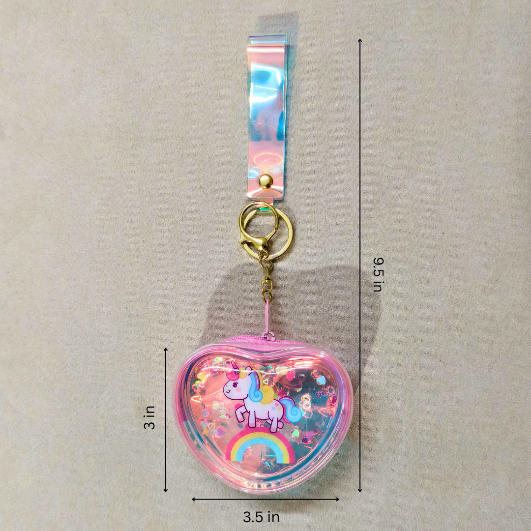 Heart-shaped keychain with unicorn design and measurements on a beige background