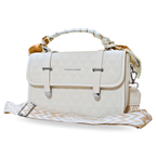 White handbag with a patterned strap on a white background