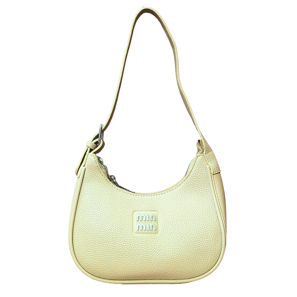 Light yellow handbag with 'min min' logo on a white background