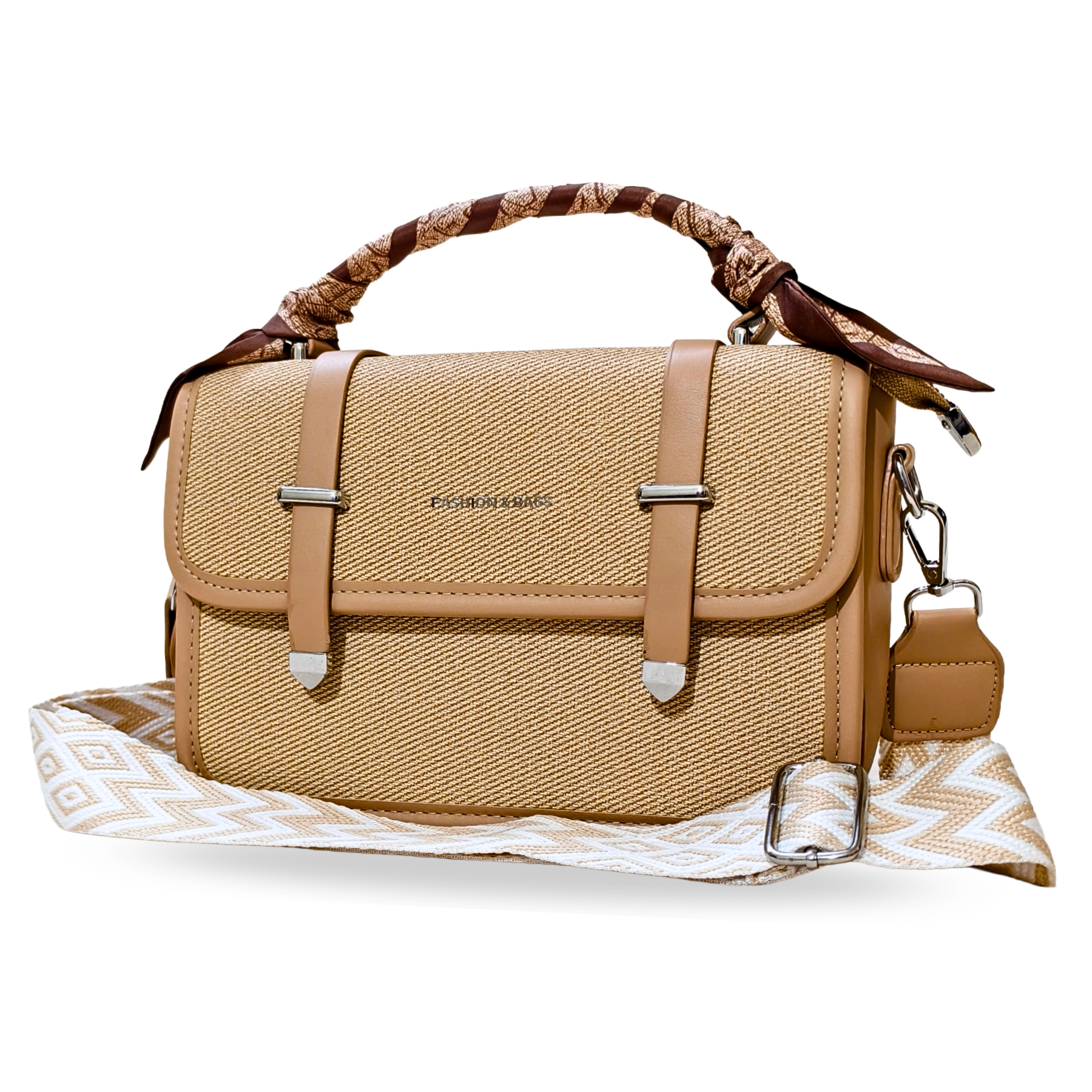 beige sling bag with patterned strap in front of a white background.