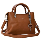 Brown leather handbag with chain detail on a white background