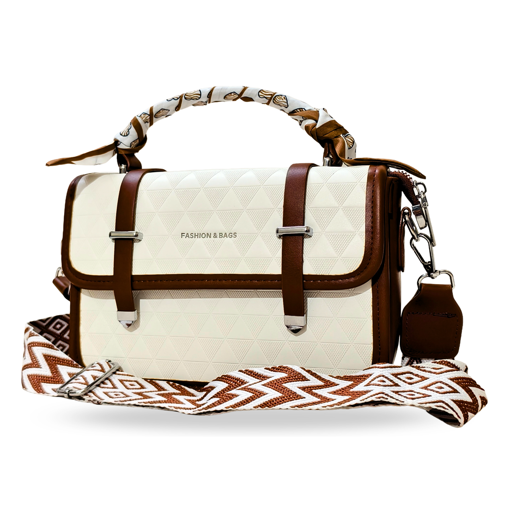 White & Brown sling bag with a strap attached to it in front of a white background.