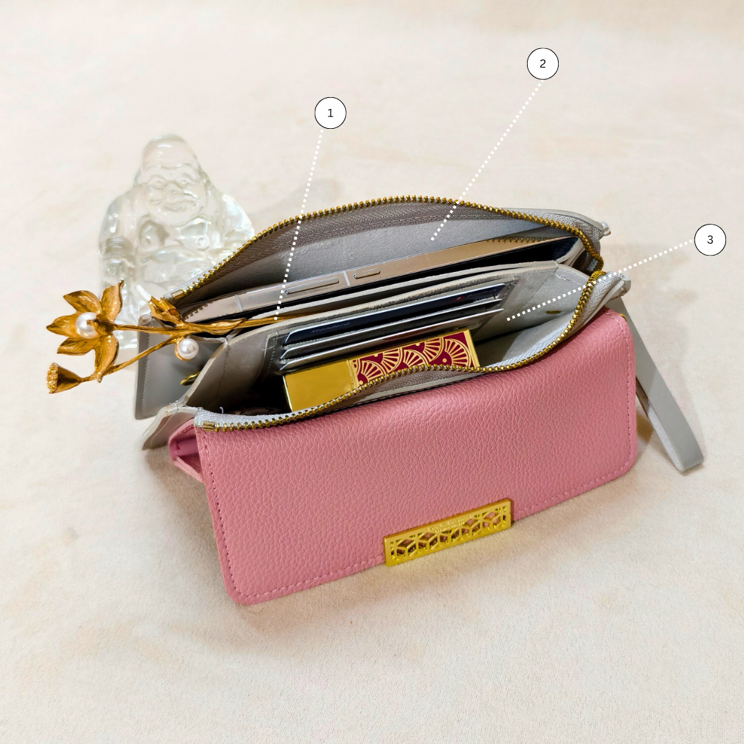 Pink wallet with card slots and a decorative element on a light background