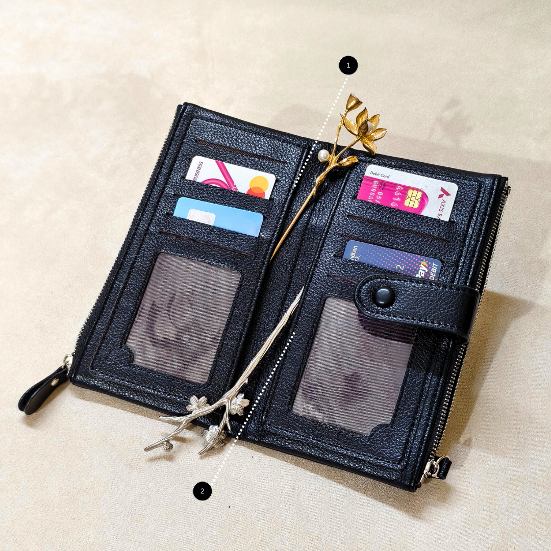 Black leather wallet with card slots on a beige background