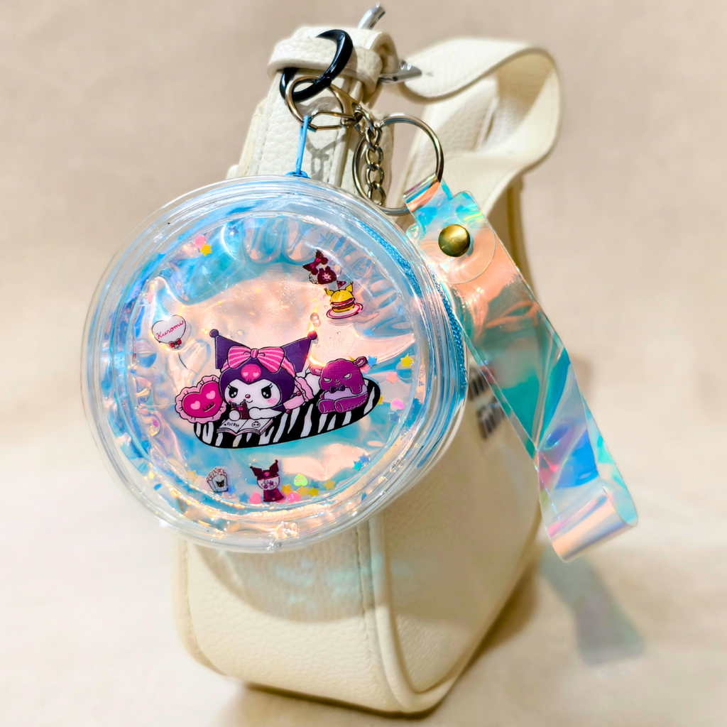Colorful keychain with cartoon character on a beige background