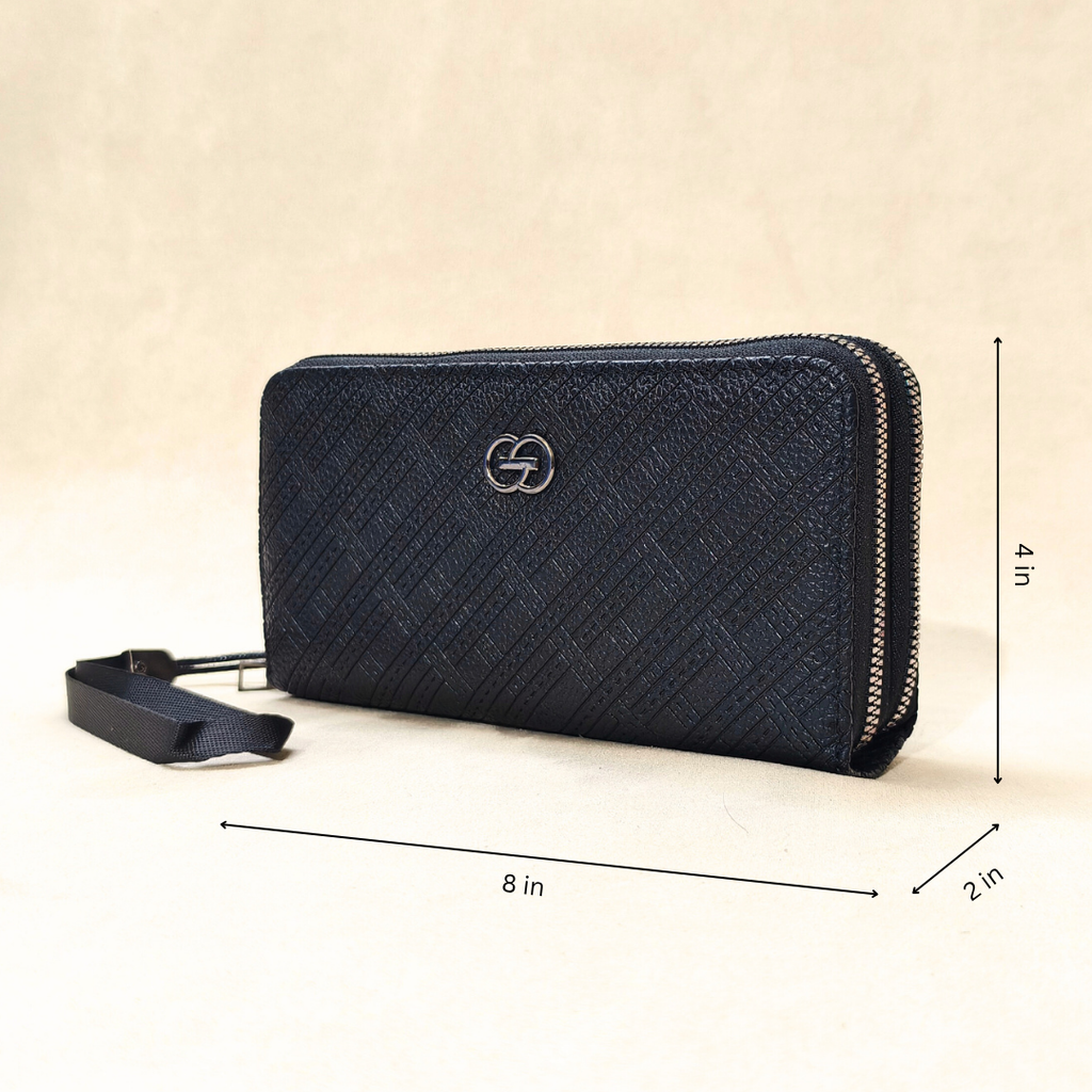 black wallet in front of a neutral background