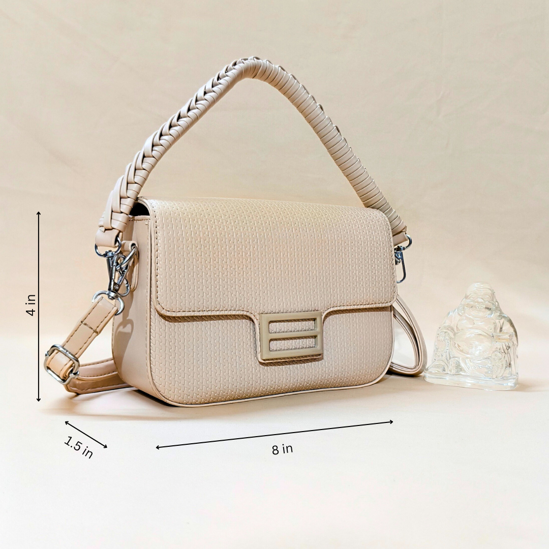 Beige handbag with braided handle on a beige background, featuring dimensions.