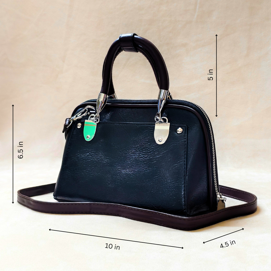 Black handbag with measurements on a beige background
