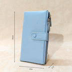 Light blue wallet with measurements on a beige background