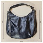 Black handbag with chain details on a beige background, shown with measurements.
