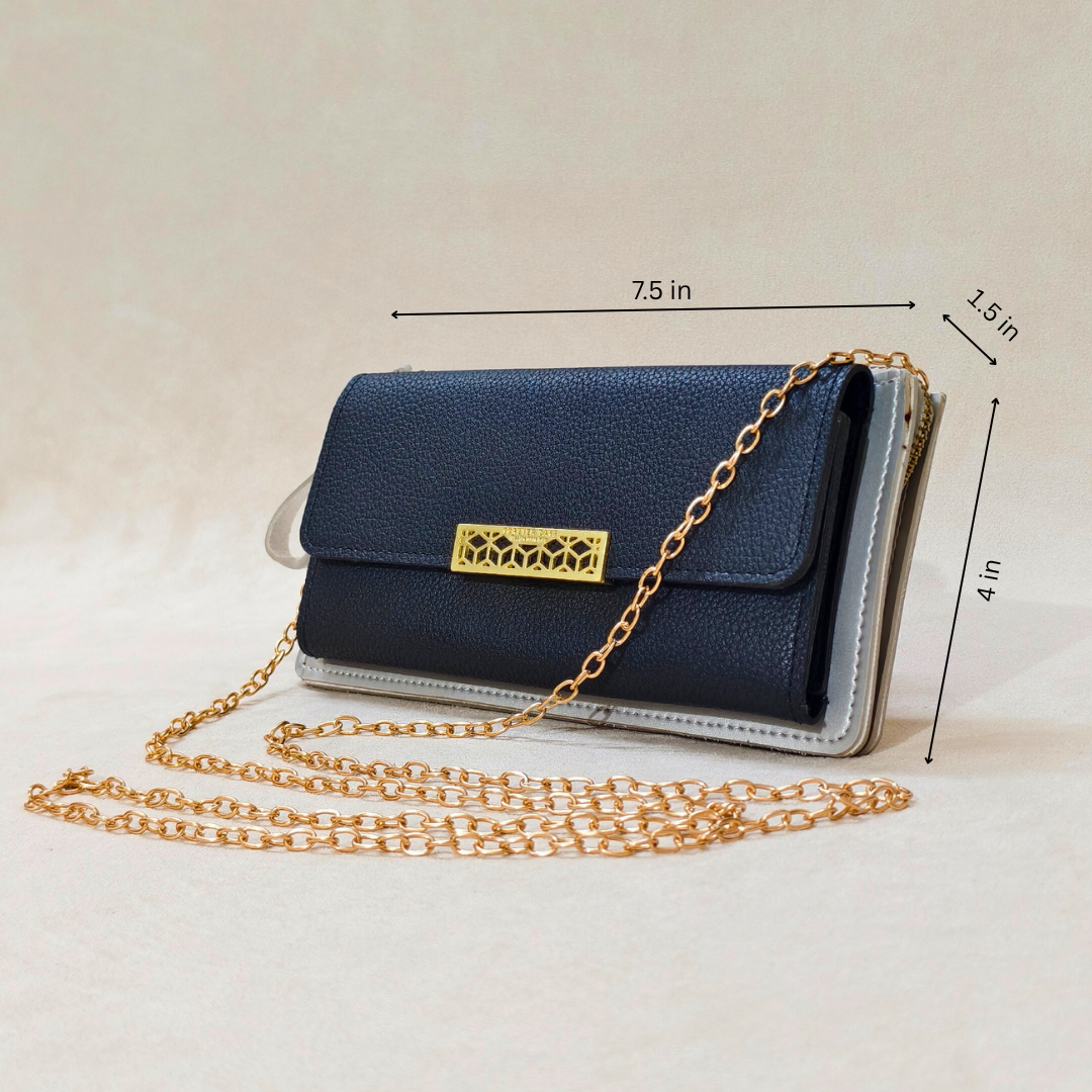 Navy blue handbag with gold chain and measurements on a light background